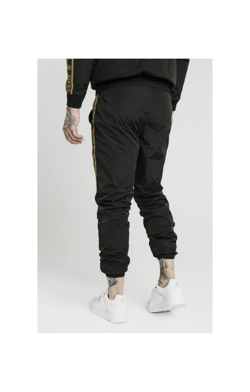SikSilk Crushed Nylon Taped Joggers – Black & Gold - Image 3